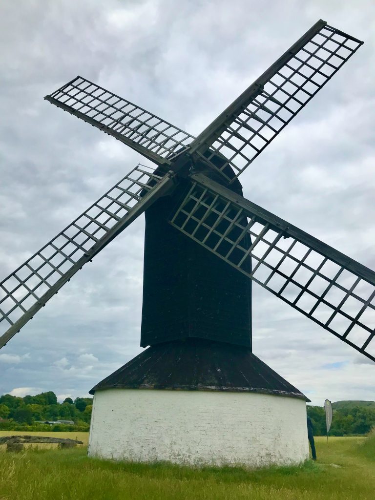 A front on view f Pitstone Windmill showing the sails. There are no sailcloths on the sails.