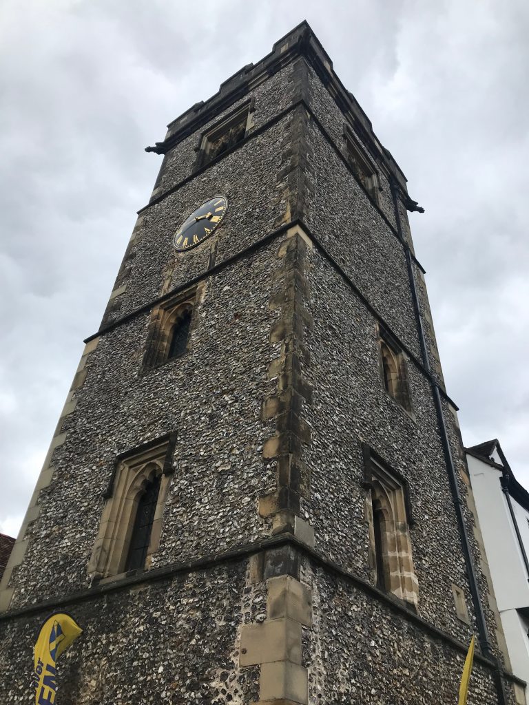 A view from the ground looking up at St Albans Clock Tower